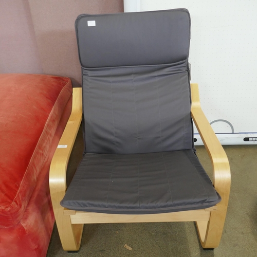 3216 - A modern curved leg rocking chair with footstool