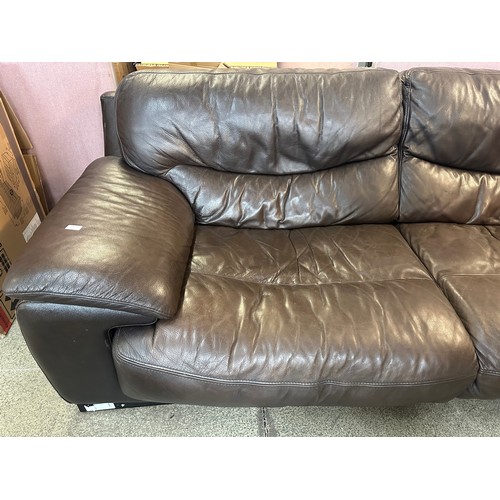 3197 - A brown four seater leather sofa