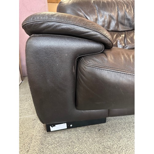 3197 - A brown four seater leather sofa