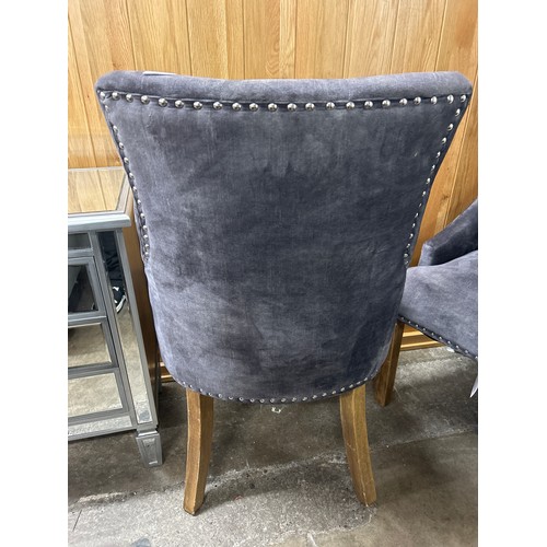 3164 - A pair of dark grey velvet upholstered dining chairs