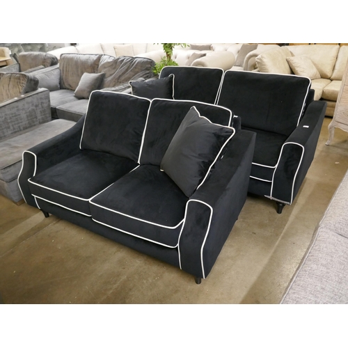 3025 - A black velvet with white piping three seater and two seater sofa