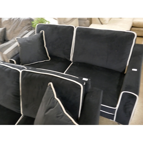 3025 - A black velvet with white piping three seater and two seater sofa