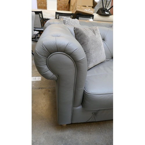 3036 - A grey leather Chesterfield 2.5 seater sofa