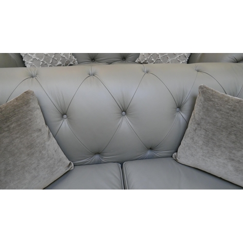 3036 - A grey leather Chesterfield 2.5 seater sofa