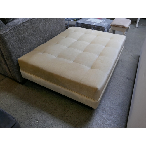 3056 - A buttermilk velvet footstool