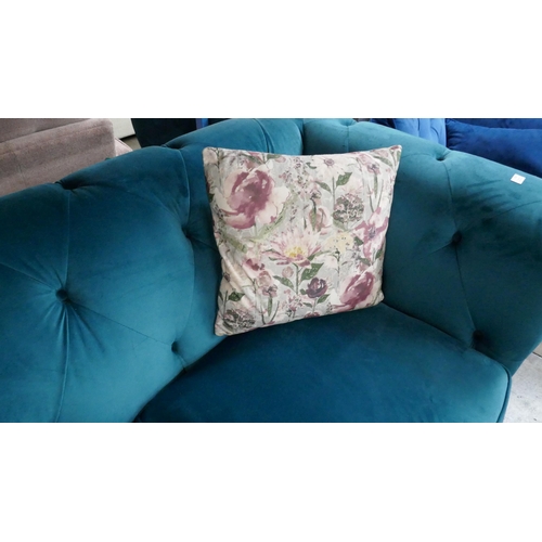 3060 - A turquoise velvet Chesterfield three seater sofa