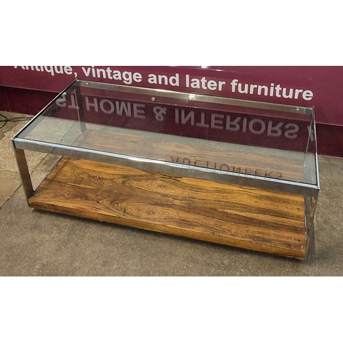 3 - A Merrow Associates rosewood, chrome and glass topped rectangular table, designed by Richard Young. ... 