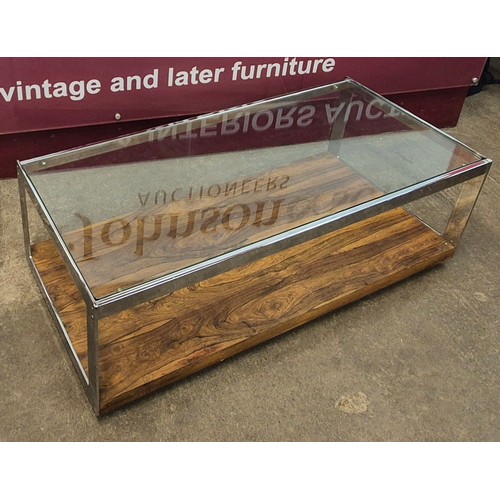 3 - A Merrow Associates rosewood, chrome and glass topped rectangular table, designed by Richard Young. ... 