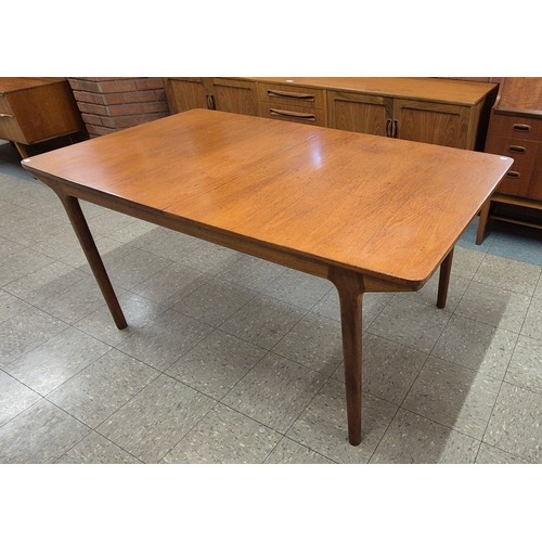 18 - A McIntosh T3 model teak extending dining table, designed by Tom Robertson