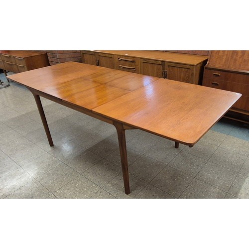 18 - A McIntosh T3 model teak extending dining table, designed by Tom Rebertson