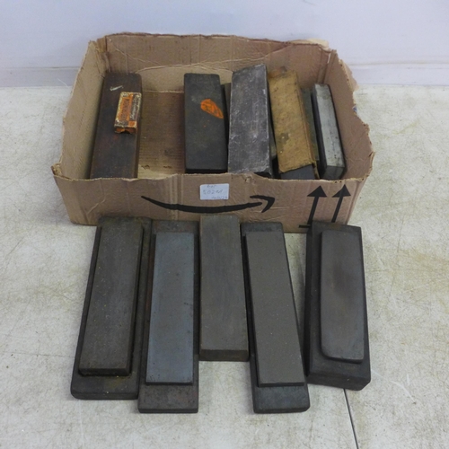 5029A - A box of approximately 30 sharpening stones including oil, whet and natural stones