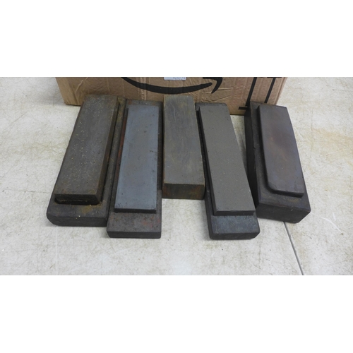 5029A - A box of approximately 30 sharpening stones including oil, whet and natural stones