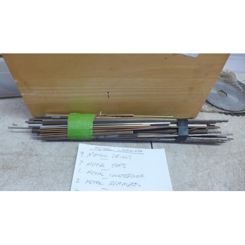 5037 - A box of metal working tools including drill bits, taps, countersinks, cutting discs, etc.