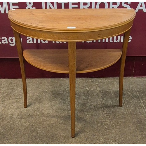 22 - A Legate teak demi-lune hall table