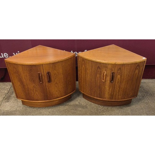 29 - A pair of G-Plan Fresco teak corner cupboards