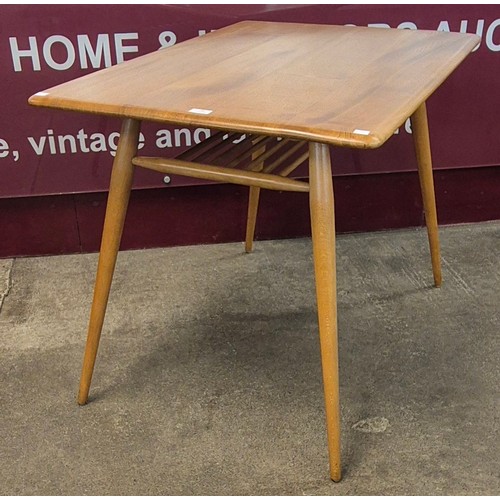 26 - An Ercol Blonde elm and beech Windsor breakfast table