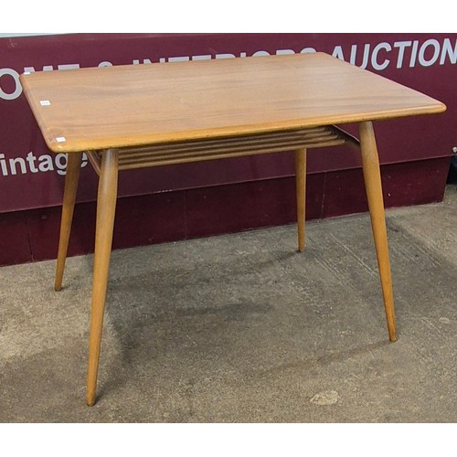 26 - An Ercol Blonde elm and beech Windsor breakfast table