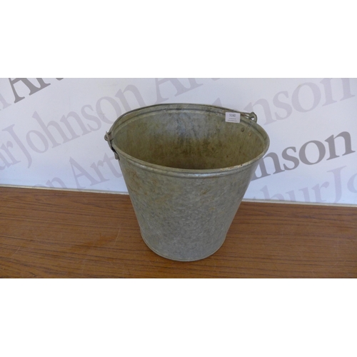 5160 - A galvanised steel watering can and bucket