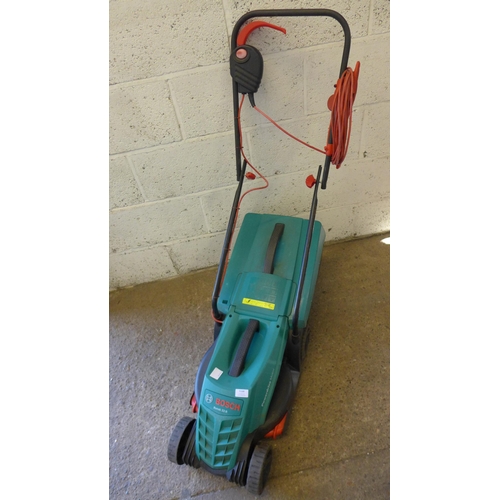 5168 - A Bosch Rotak 32R electric lawnmower with collection box and a Black and Decker GT5050 electric hedg... 