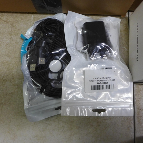 5060 - 2 boxes of assorted USB cables, car phone holders, chargers etc.