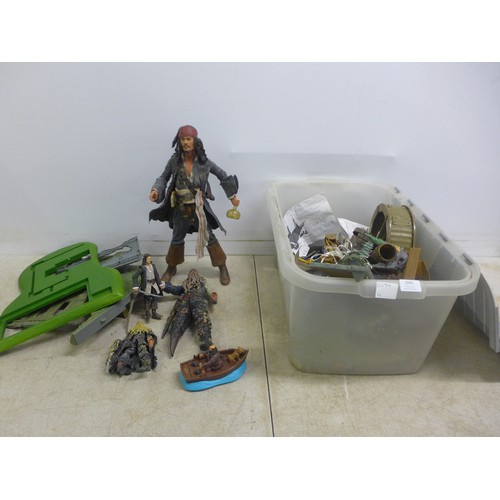 5062A - A large quantity of collectable Pirates of the Caribbean model figurines and other playset items inc... 