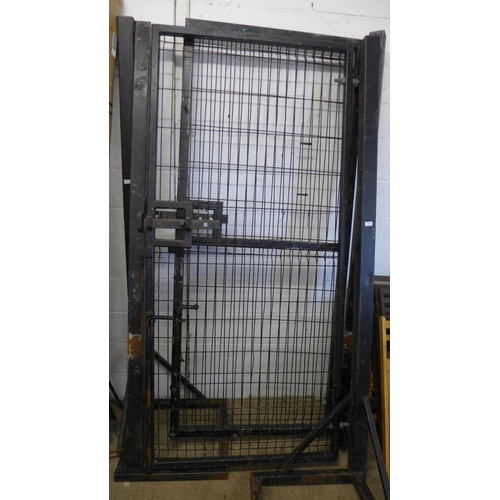 5206 - A pair of heavy duty steel security gates with freestanding gate posts