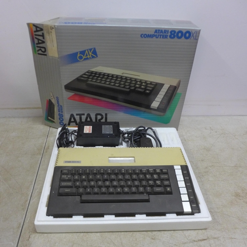 5080 - An Atari 800XL vintage computer system including an Atari 800XL, an Atari 1010 program recorder, an ... 