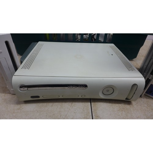 5063 - A quantity of gaming equipment including an XBox 360 with HDD, a silver prestige edition Playstation... 