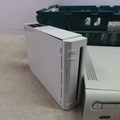 5063 - A quantity of gaming equipment including an XBox 360 with HDD, a silver prestige edition Playstation... 