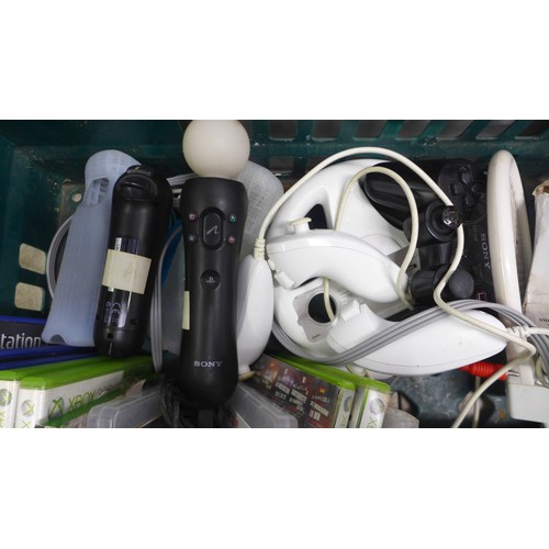 5063 - A quantity of gaming equipment including an XBox 360 with HDD, a silver prestige edition Playstation... 