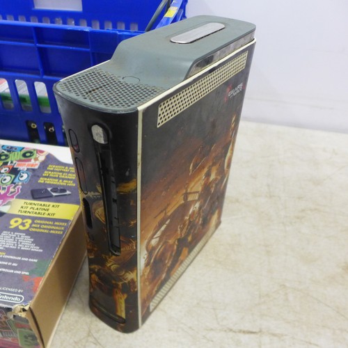 5064 - A quantity of gaming equipment including an XBox 360 with HDD, a Playstation 2, a Nintendo Wii, asso... 