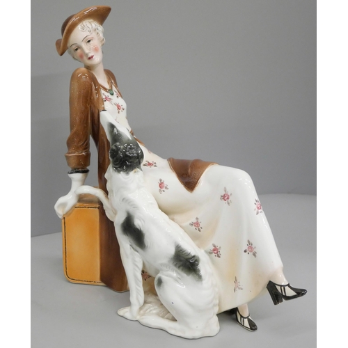 603 - A 1930s Katzhutte porcelain Art Deco figure of a lady with dog