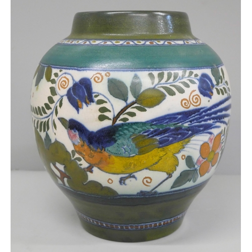 610 - A Dutch Gouda Art Nouveau vase, with blue bird design, 23.5cm