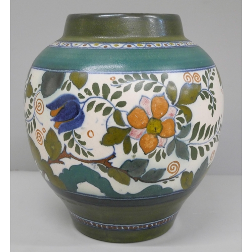 610 - A Dutch Gouda Art Nouveau vase, with blue bird design, 23.5cm