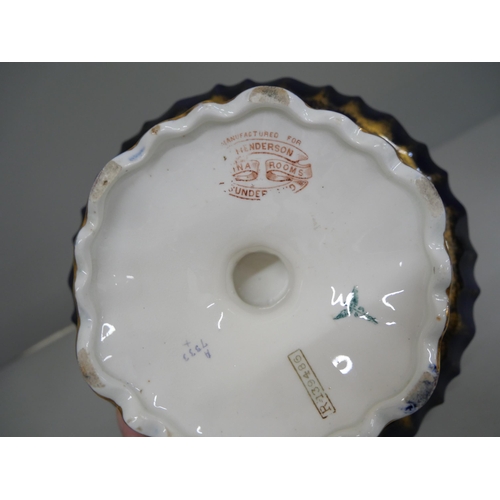 628 - A hand decorated comport, marked 'Manufactured for Henderson China Rooms, Sunderland', circa 1900, t... 