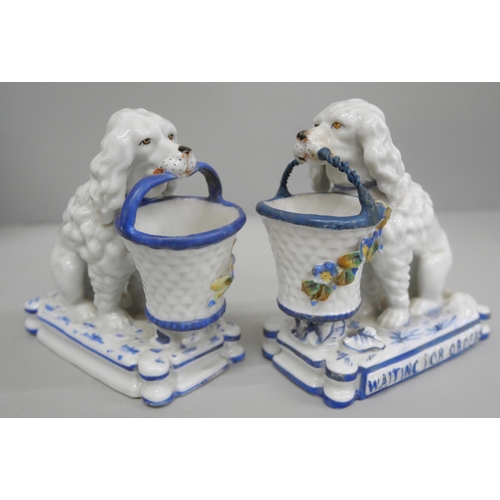 629 - A pair of figural spaniel match holders, 