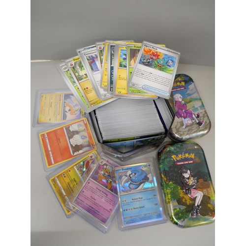 632 - 600 plus Pokémon cards including colour graphic and Black Star rares and tins