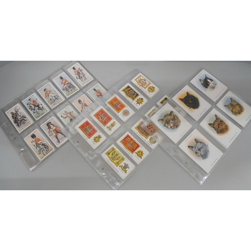 633 - Cigarette cards; three sets - Player's Cats (24), Player's Regimental Uniforms (50) and Player's Dru... 