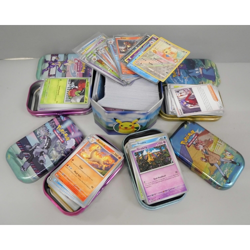 639 - 600 plus Pokémon cards including colour graphic and Black Star rares and tins