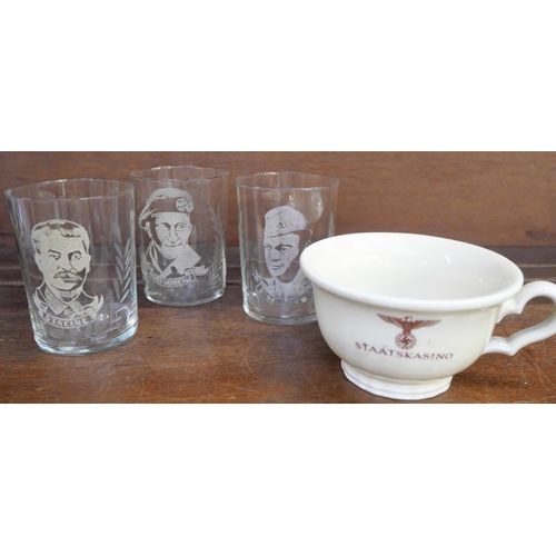 644 - Three WWII shot glasses, Stalin, Montgomery and Eisenhower plus a German Third Reich tea cup, Staats... 