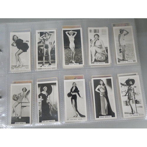 649 - Cigarette cards; an album of cigarette cards containing ten complete sets including Players 'Wrestli... 