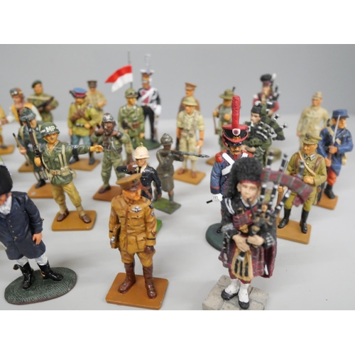 660 - A collection of Sculptures UK resin figures of pipers and a collection of del Prado metal models of ... 