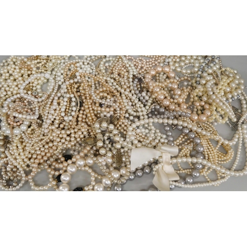 662 - A collection of faux pearl necklets and bracelets