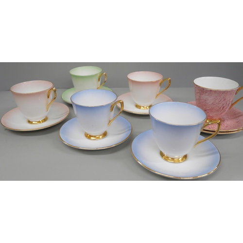 665 - Royal Albert cups and saucers, five of one set, a separate cup and two saucers and a boxed set of De... 