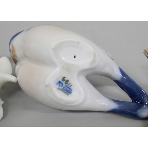 679 - A collection of ornaments including milk glass boots, a/f, Fenton glass, three Copenhagen bird figur... 