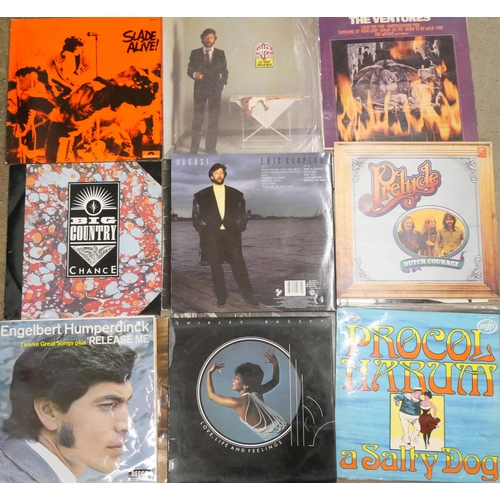 687 - A collection of fifteen LP records and 12