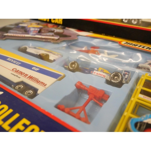 695 - Two vintage Matchbox The Nigel Mansell collection F1 and Indy Car vehicle sets