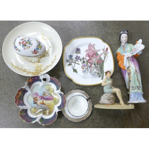 707 - An oriental figure, a pair of small Dresden figures, a Spode plate, a Coalport Ming Rose egg shaped ... 