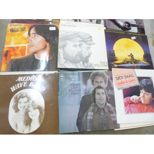 711 - A box of LP records and 7