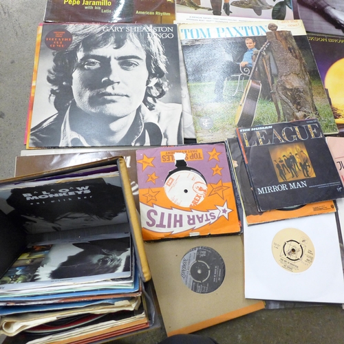 711 - A box of LP records and 7